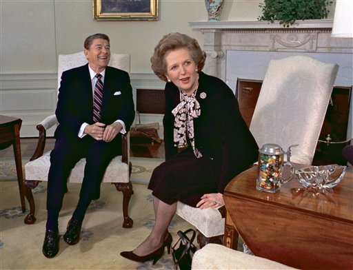 In this Feb. 20, 1985 file photo, former British Prime Minister Margaret Thatcher meets with her friend and political ally President Ronald Reagan during a visit to the White House in Washington. Thatcher, who led Britain for 11 years, died of a stroke Monday morning, April 8, 2013. (AP Photo/J. Scott Applewhite, file)