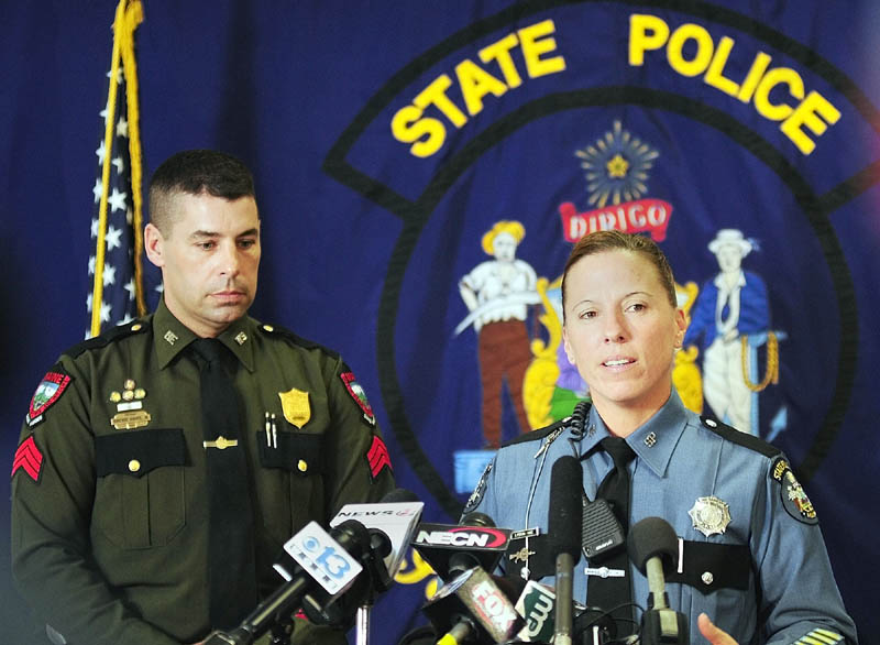 Warden Service Sgt. Terry Hughes, left, and State Police Trooper Diane Perkins-Vance talk about capturing Christopher Knight during a news conference on Wednesdayin Augusta.