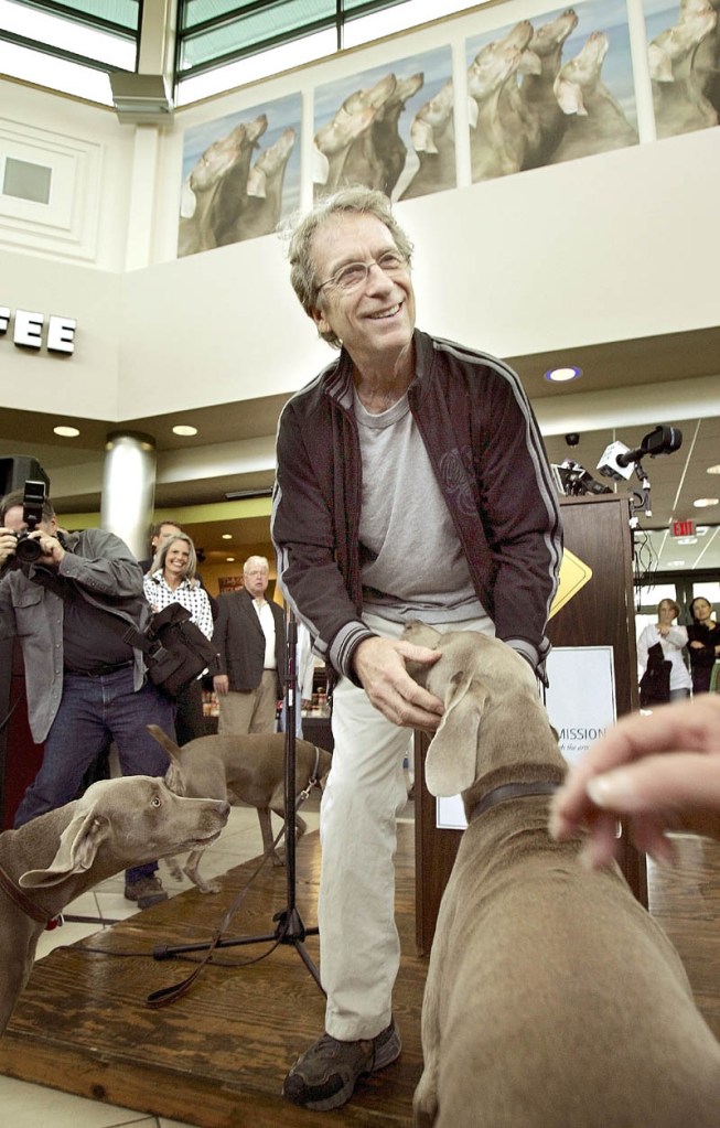 Photographer William Wegman is joined by his Weimaraners during the unveiling of his photographic mural in June of 2007.