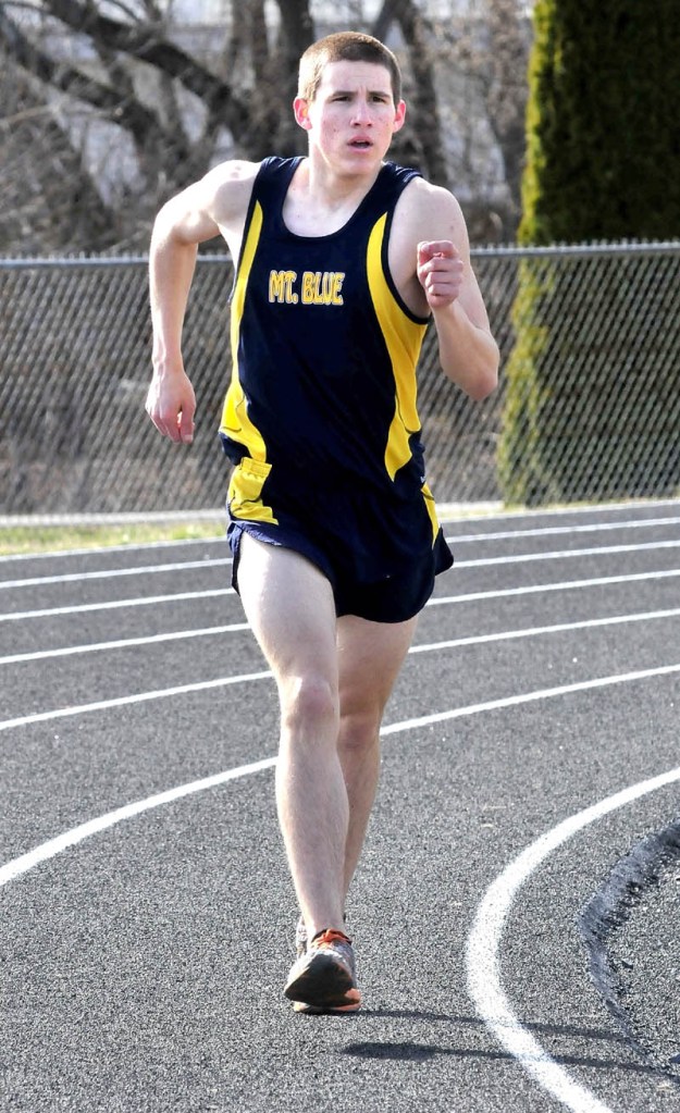 ON THE MOVE: Mt. Blue’s Zach Veayo competes in the 1,600-meter race walk during a track and field meet Thursday at Winslow High School.