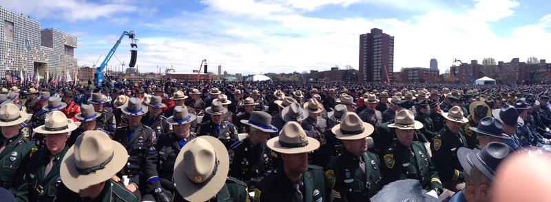 Hundreds of police from around the region, including from Maine, gather at a memorial for campus police officer Sean Collier in Cambridge on Wednesday. Collier was slain last week in the aftermath of the Boston Marathon bombings.