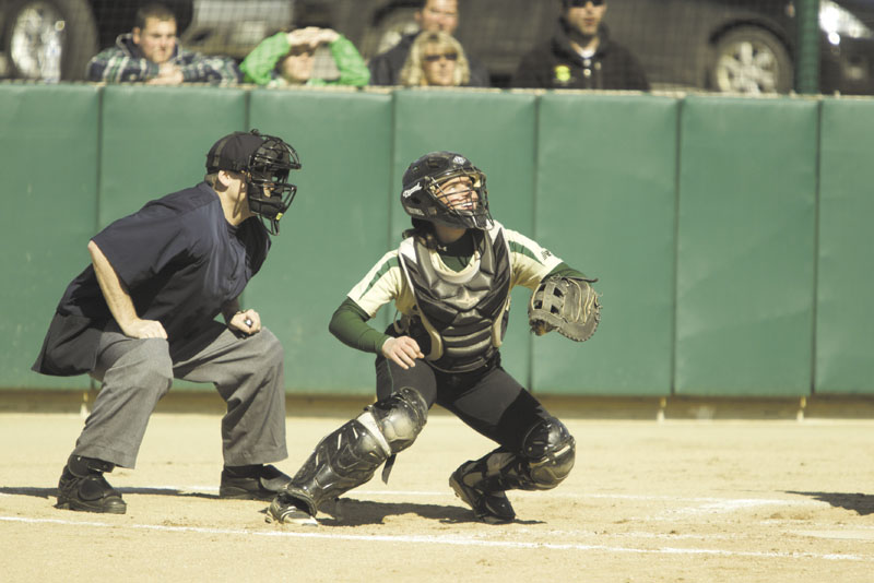 CATCHING ON: Former Maranacook Community School catcher Heidi Shaw has become a slap-hitting switch hitter at Husson University.