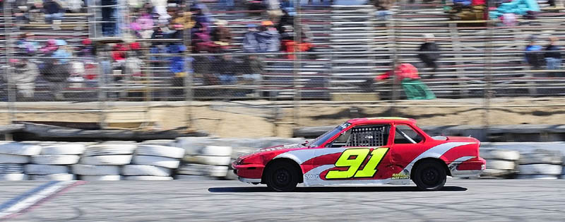 Jamie Heath, of Waterford, wins the Thunder Four feature race on the first day of the 2013 racing season on Saturday April 6, 2013 at Wiscasset Speedway.