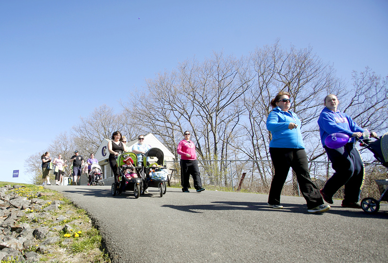 Walkers head to Baxter Boulevard at the start of the March of Dimes March for Babies fundraiser at Cheverus High School in Portland on Sunday.
