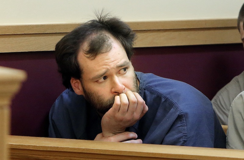 Brian Morin looks toward co-defendant Bryan Wood, (not pictured) as the two Lewiston men were arraigned Monday, May 13, 2013, in Lewiston District Court on three charges each of arson.