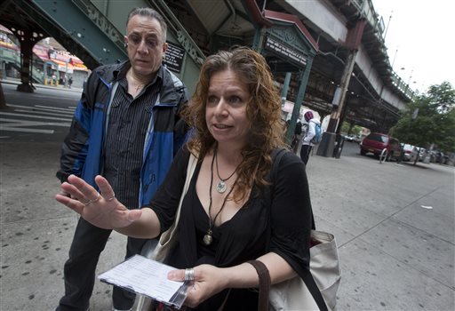 Folklorist Elena Martinez of City Lore, and her partner Bobby Sanabria, talk about their tours of The Bronx borough of New York on Wednesday.