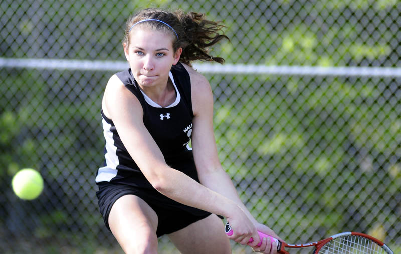Hall-Dale High School’s Clio Barr returns a serve to Dirigo High Schoo’s Addy Fuller during a match Monday in Farmingdale. Barr won 6-2, 6-4. Hall-Dale won the match 4-1. For more tennis, see C4.