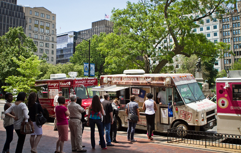 The Red Hook Lobster Pound DC food truck welcomes hundreds of customers during lunch at Farragut Square, in Washington D.C., on Friday.