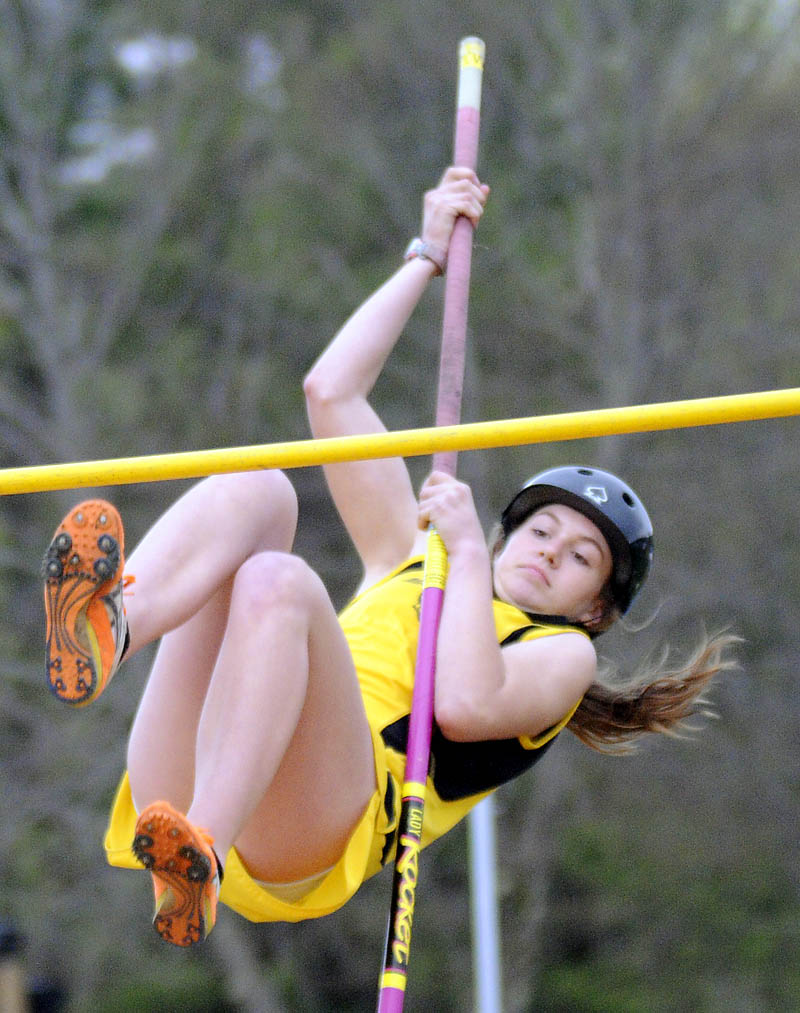 UP AND OVER: Maranacook Community School’s Taylor Cray clears the 6-foot bar in the pole vault Thursday during a track and field meet in Readfield. Cray finished fifth with a leap of 6-6. Messalonskee’s Taylor Lenentine was first with a vault of 9-0. For complete results, see C6.