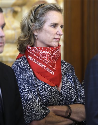 Kerry Kennedy listens to a speaker at a farm workers fair labor practices news conference in Albany, N.Y., on May 13, 2013. A North Castle, N.Y., judge will decide Tuesday whether Kennedy should go to trial in a drugged-driving case.