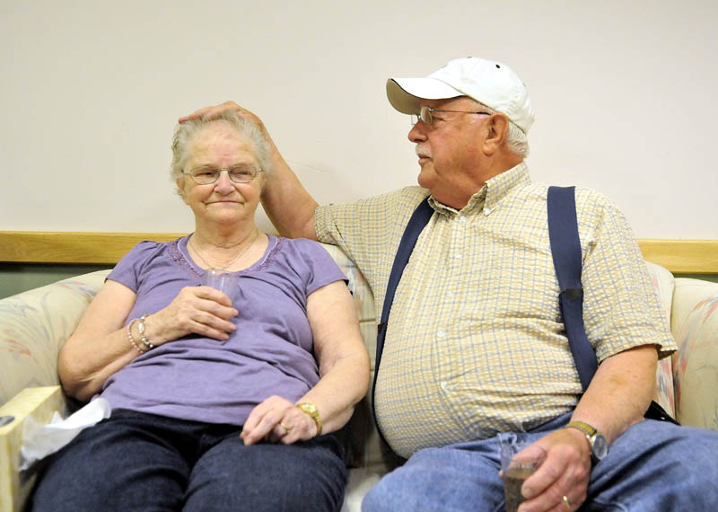 Gerald "Jake" Ellis, 79, and his wife Pauline Ellis, 79, sing during recreation time at Lakewood Nursing Home in Waterville Wednesday morning.