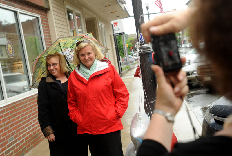 Rep. Chellie Pingree pauses for a picture with Pamela Trinward on Main Street during a walking tour of downtown Waterville Wednesday.