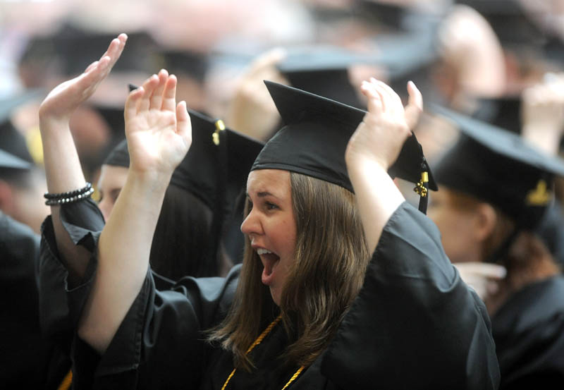 Rachel Clark celebrates with the class of 2013 at Thomas College's 119th commencement ceremony in Waterville on Saturday.