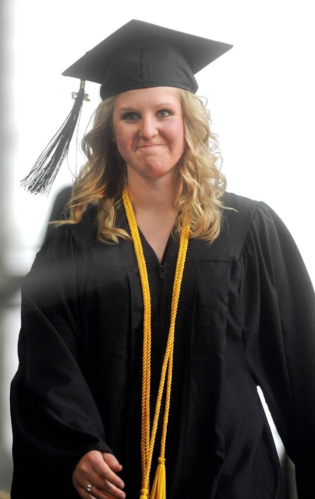 Shelby Gilcott waits for her name to be called to accept her diploma during Thomas College's 119th commencement ceremony on Saturday.