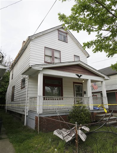 Amanda Berry, Gina DeJesus and Michelle Knight, who went missing separately about a decade ago, were found in this house just south of downtown Cleveland and likely had been tied up during years of captivity, said police, who arrested three brothers.