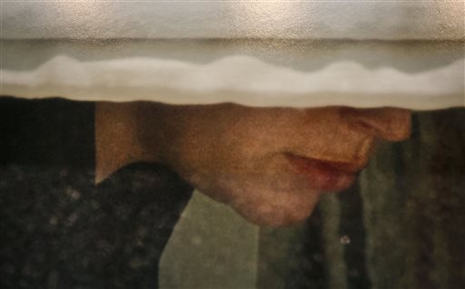A detail from a photo by Arne Svenson that hangs inside the Julie Saul Gallery in New York. Residents of an apartment building are livid over the exhibition of photos secretly snapped through their apartment windows.