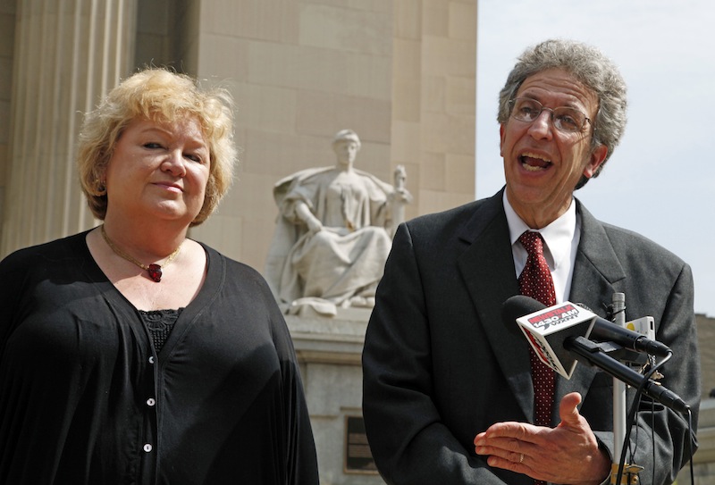 This June 6, 2011 file photo shows Betty Cockrum, left, president of Planned Parenthood of Indiana and attorney Ken Faulk speaking to reporters outside the Federal Courthouse in Indianapolis. Indiana will likely stop defending a law that stripped Medicaid funds from Planned Parenthood after the Supreme Court declined to hear the case Tuesday, May 28, 2013 an attorney who represents the nation's largest abortion provider said. (AP Photo/Michael Conroy, FILE)