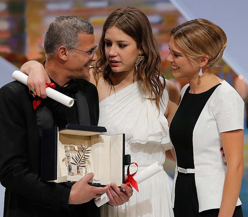 Director Abdellatif Kechiche and actors Adele Exarchopoulos and Lea Seydoux react after they receive the Palme d'Or award for "Blue Is the Warmest Color: The Life of Adele" at the awards ceremony at the 66th international film festival, in Cannes, southern France on Sunday.