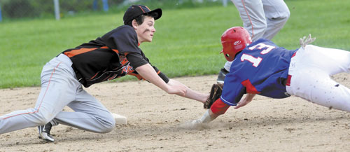 MAKE THE TAG: Skowhegan’s Derek McCarty tags out Messalonskee’s Ben Frazee at second base during the Eagles’ 11-3 win on Monday in Skowhegan.