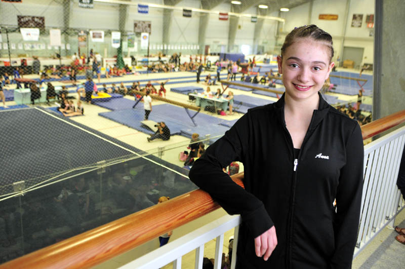 DOING WHAT SHE LOVES: Anna Curtis had surgery on Oct. 2 to correct an abnormal curvature of her spine. She was told she would not be able to compete in gymnastics, but proved her doctors wrong. Last weekend, she won an all-around New England title.