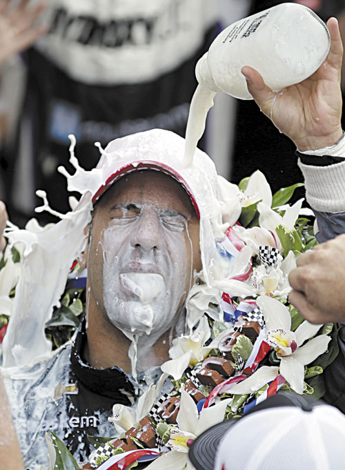 WINNER: Tony Kanaan celebrates with milk after winning the Indianapolis 500 on Sunday at the Indianapolis Motor Speedway in Indianapolis.