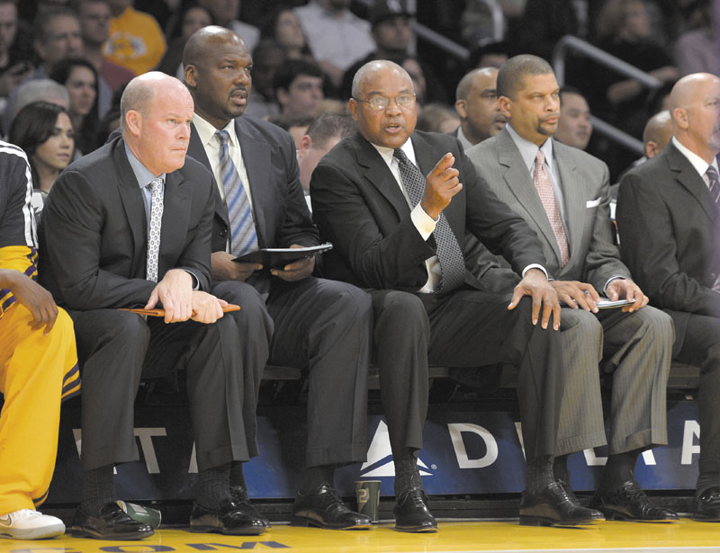 LANDING A HEAD JOB: University of Maine at Farmington graduate Steve Clifford, left, was introduced Wednesday at the Charlotte Bobcats head coach. Clifford graduated from UMF in 1983.