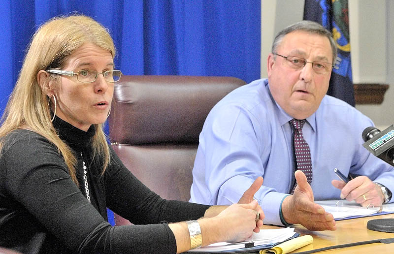 Department of Health and Human Services Commissioner Mary Mayhew, left, and Gov. Paul LePage answer questions during a news conference on Thursday in the State House in Augusta.