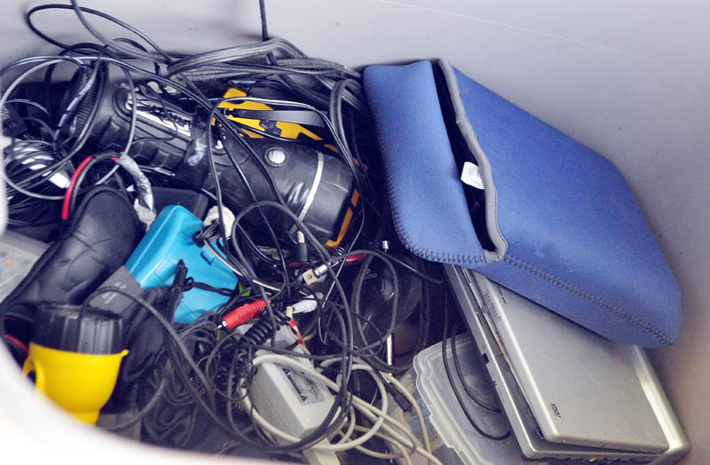 State police displayed items recovered from the campsite of the North Pond Hermit, Christopher Knight, during an event at the Troop C barracks on Saturday in Skowhegan.