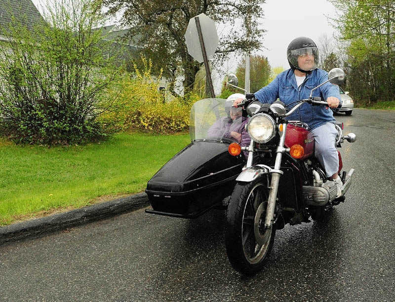 Donna McGibney rides her Honda GoldWing with her mother Charlotte McGibney on Friday in Readfield.