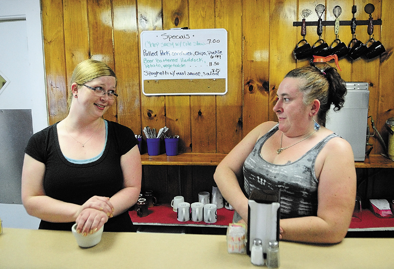 Employees Tricia Healey, left, and Jonica Palmer talk about how construction has negatively affected their lunch time crowds at Windsor Diner on Thursday in Windsor.