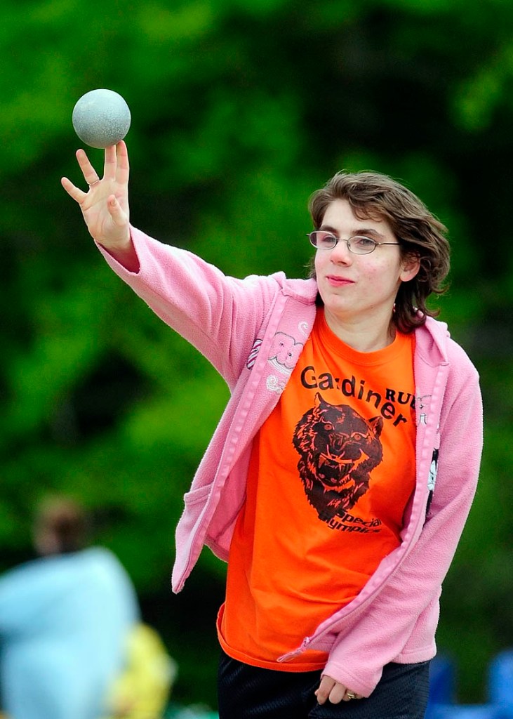 Gardiner athlete Ruby Fowler puts the shot during the Kennebec Area Special Olympics Games on Tuesday at Hall-Dale High School in Farmingdale.
