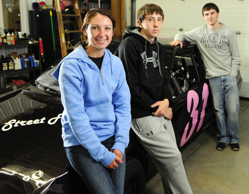 FAMILY BUSINESS: Leandra Martin, left, joined her cousins Cody, center, and Nate Tribbet as race car drivers at Wiscasset Speedway. Martin is driving a car in the Thunder 4