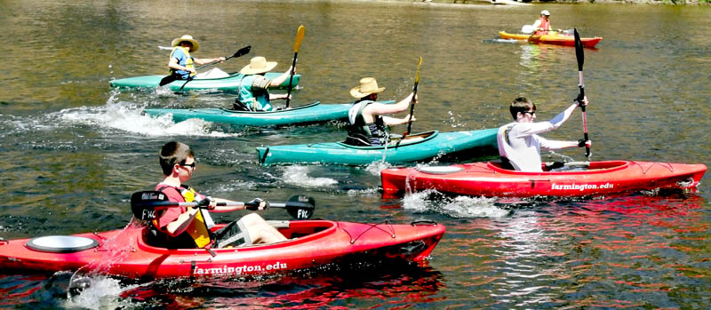 Some of the 40 kayaks, canoes and paddlers take off in the start of a 10-mile trip from Strong to Fairbanks, during the University of Maine at Farmington Mainely Outdoors Program's third annual Cinco de Mayo Canoe Race & Fun Paddle on Sunday.