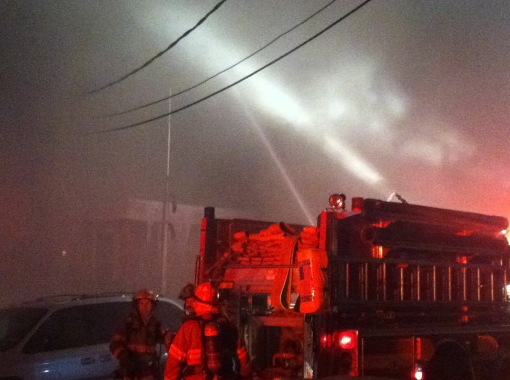 Firefighters battle a multi-structure blaze in downtown Lewiston in the early hours of Saturday morning.