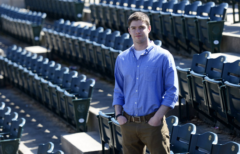 James Nutter, a former University of Southern Maine baseball player, revisits the USM baseball field in Gorham on Wednesday. He is now in demand as a speaker about the gay experience in team sports.