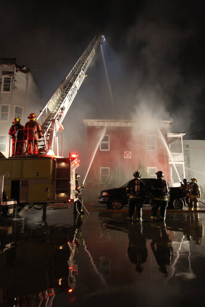 The scene Friday night was surreal as two buildings on Pierce Street and two more on Bartlett Street were ablaze. Smoke could be seen from miles away, and the night was lit in orange and red.