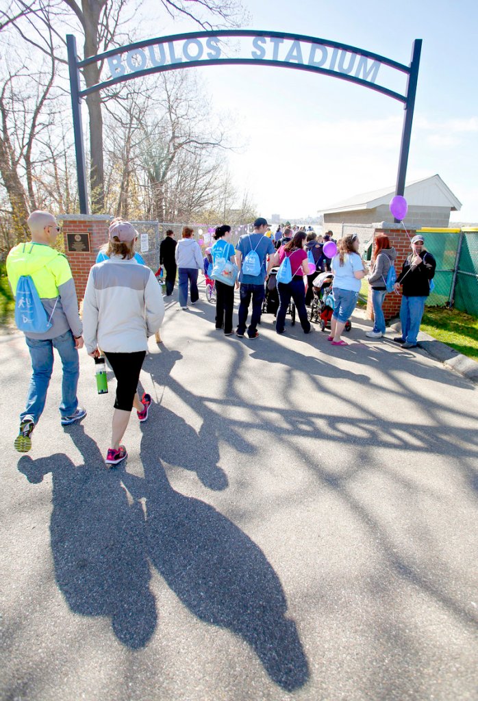 Walkers head down to Baxter Boulevard at the start of the March of Dimes March for Babies event at Cheverus High School on Sunday morning in Portland.