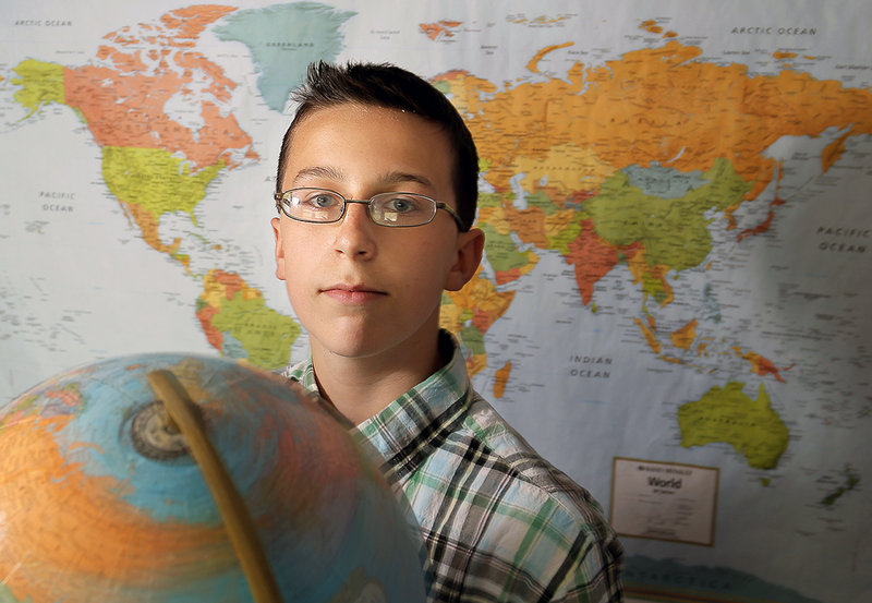 Archer Thomas, 13, an eighth grader at Bonny Eagle Middle School, poses for a portrait in his Buxton home Friday, May 17, 2013. Thomas will be competing next week in the National Geographic Bee in Washington, D.C.