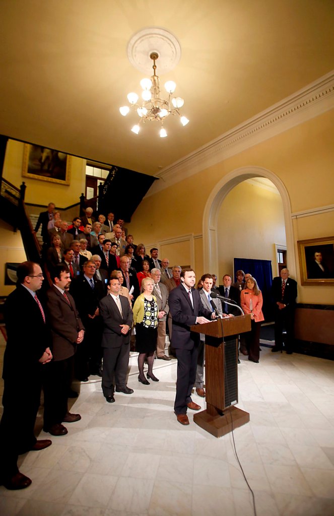 At a news conference Wednesday, May 29, 2013, House Speaker Mark Eves, D-North Berwick, left, and Senate President Justin Alfond, D-Portland, address the media at the Maine State House on the state's budget and possibly delaying a massive tax.