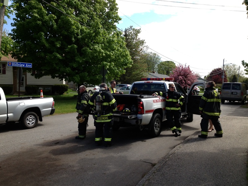 Firefighters block a section of Hillview Avenue in Saco on Saturday during a standoff.