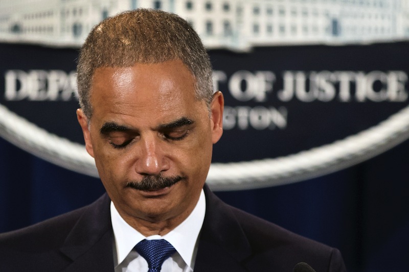 Attorney General Eric Holder expresses disappointment in the Supreme Court's 5-4 ruling in the Alabama voting rights case, Shelby County v. Holder, Tuesday, June 25, 2013, at the Justice Department in Washington. The court declared unconstitutional a provision of the landmark Voting Rights Act that determines which states and localities must get Washington's approval for proposed election changes. (AP Photo/J. Scott Applewhite)