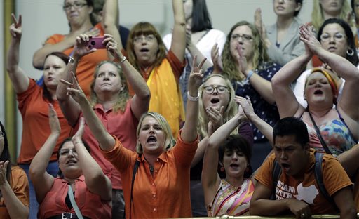 Members of the gallery cheer and chant as the Texas Senate tries to bring an abortion bill to a vote as time expires on Wednesday in Austin, Texas.