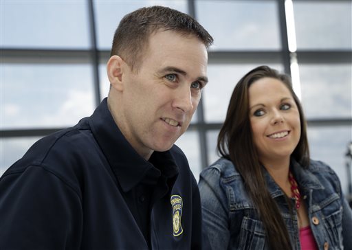 MBTA Police Officer Richard Donohue smiles with his wife, Kim, during an interview on May 19, 2013, at Spaulding Rehabilitation Hospital in Boston's Charlestown section. Donohue almost lost his life after being shot during the crossfire with the Boston Marathon bombing suspects in Watertown, Mass.