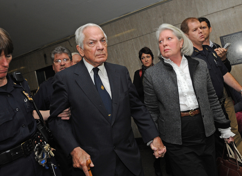 Anthony Marshall, Brooke Astor's son, center, exits court in Manhattan with wife Charlene in 2009.