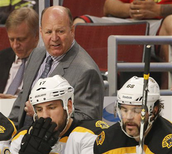 Boston Bruins coach Claude Julien reacts after a goal by the Chicago Blackhawks in the first period during Game 2 of the Stanley Cup Finals on Saturday in Chicago.