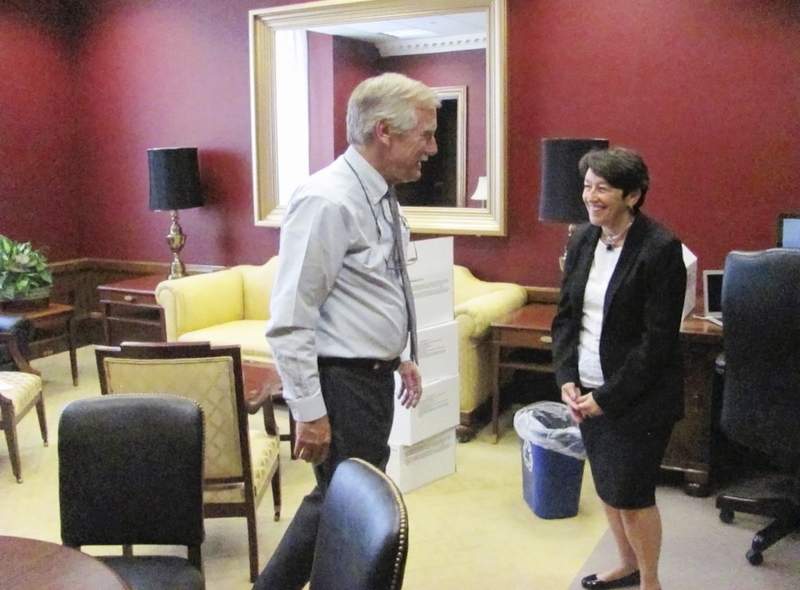 Sen. Angus King, I-Maine, talks with his chief of staff, Kay Rand, on Tuesday morning in his new, permanent office in Washington, DC.