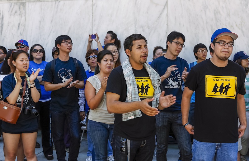 Immigrant students join a coalition of immigrant rights supporters on a 24-hour vigil outside the Federal Building in Los Angeles on Thursday. The group was calling on the U.S. Congress to pass immigration reform.