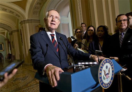 Senate Majority Leader Harry Reid of Nevada updates reporters on the pace of the immigration reform bill following a Democratic strategy session Tuesday on Capitol Hill.