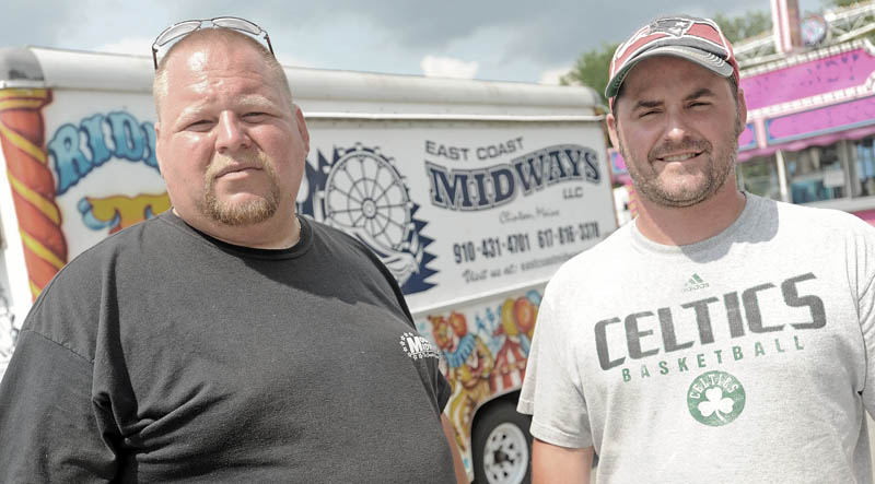 East Coast Midways owners Billy Swafford, left, and Faron Young, right, in Fairfield on Tuesday.