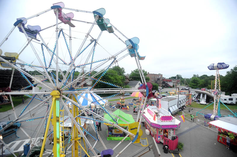 The East Coast Midways Ferris wheel dominates the Fairfield Community Days midway in Fairfield on Thursday.